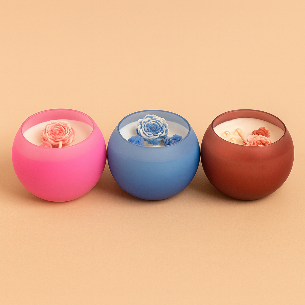 “Bloom Aura Candle Set of 3 by Karigar Kutir – pink, blue and brown handcrafted floral jar candles with wax roses and pearls for festive home decor.”