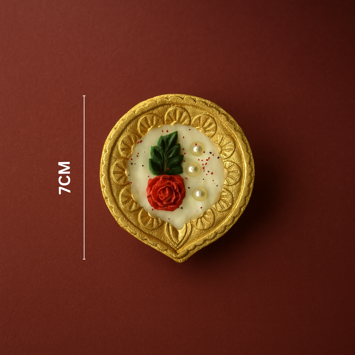 7 cm handcrafted golden diya candle with red rose and leaf design — soy wax festive décor piece with pearl detailing by Karigar Kutir