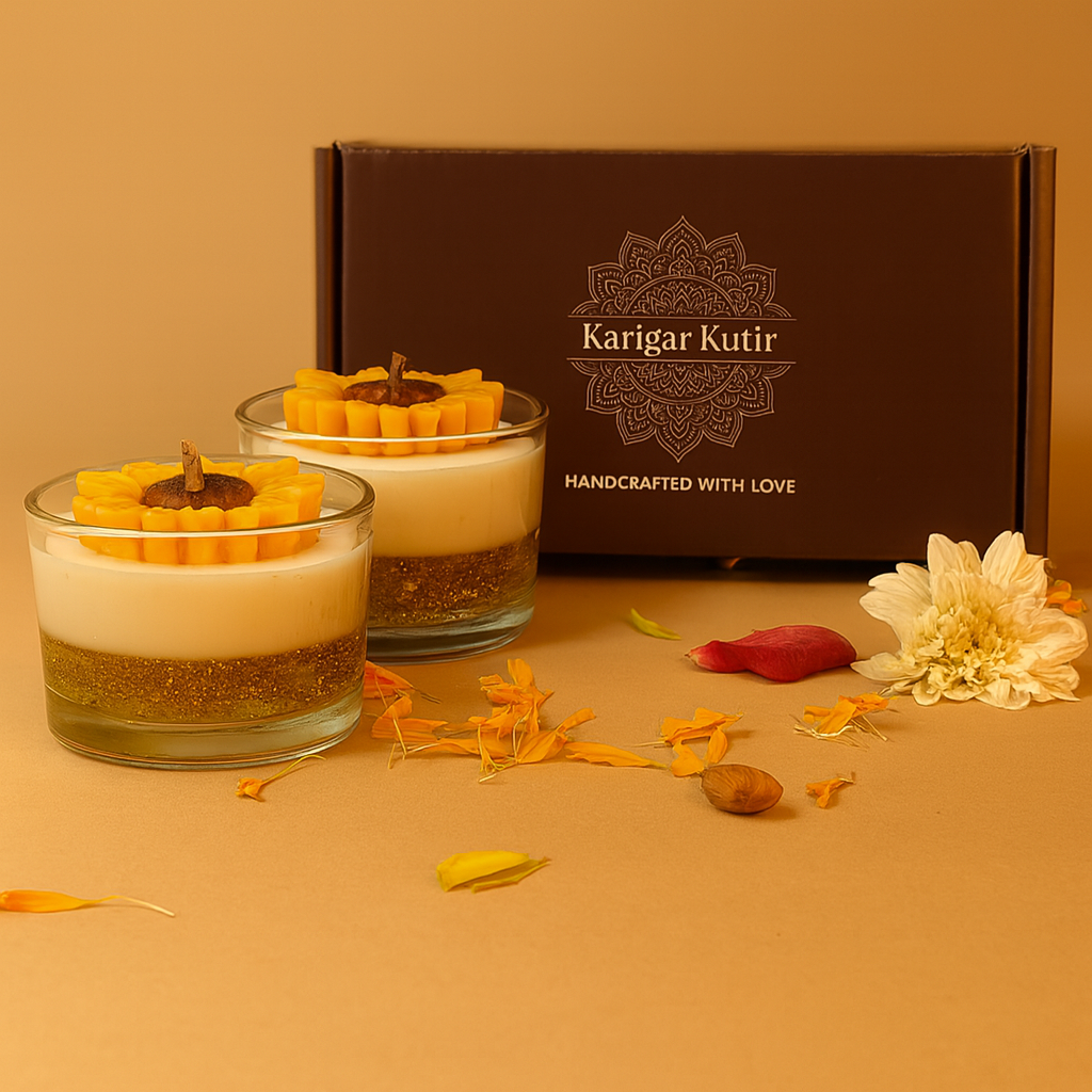 “Sunflower Motif Jar Candle Set of 2 by Karigar Kutir – handmade sunflower design candles in glass jars with gold base, packed in premium festive gift box.”